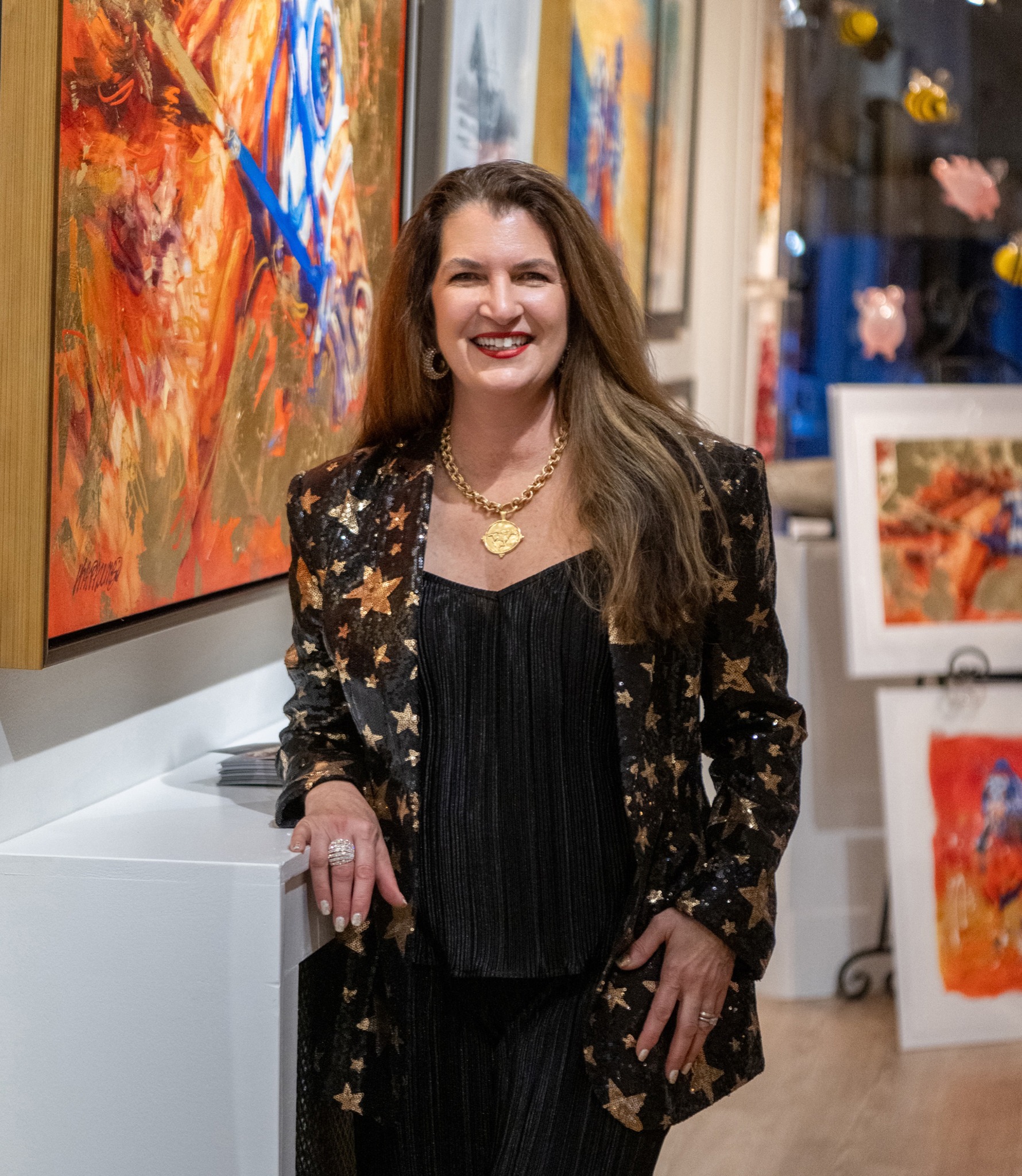 Lisa Palombo beside her Secretariat painting